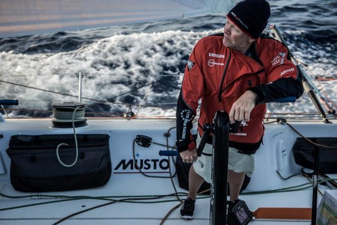 Tony Mutter (NZL) at the grinding pedestal on Day 2 of Volvo Ocean Race ©  James Blake / Volvo Ocean Race